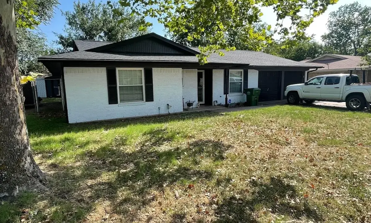 Professional roofing crew working on a residential roof in Upper Nazareth